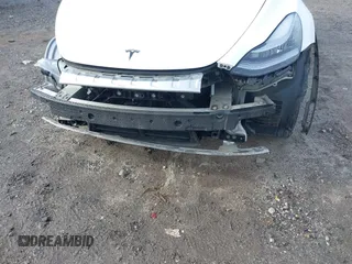 2022 Tesla Model Y Long Range z VIN 7SAYGDEE0NF435252, wystawiony jako IAAI lot #41449612 z przebiegiem 48 671 mil mil oraz . Historia ofert i sprzedaży dostępna na DreamBid. Obrazek 19.