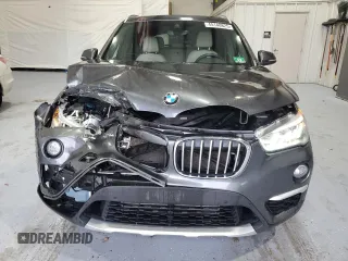 2017 BMW X1 xDrive28i with VIN WBXHT3C38H5F73265, listed as a Copart auction lot 45148825 with 95,850 mi miles and Salvage Title. Bid and sale history available at carsss.com. Image 5.