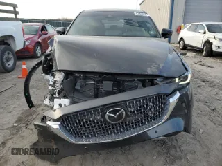 2024 Mazda CX-5 2.5 Turbo Signature with VIN JM3KFBXY7R0515256, listed as a Copart auction lot 87404694 with 4,699 mi miles and Salvage Title. Bid and sale history available at carsss.com. Image 5.