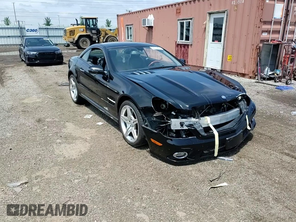 2009 Mercedes-Benz SL 550 with VIN WDBSK71F79F146967, listed as a Copart auction lot 62679494 with 57,412 mi miles and Salvage title. Bid and sale history available at DreamBid. Image 10.