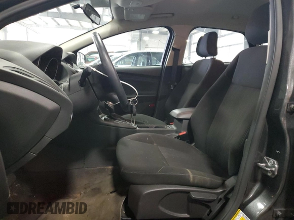 2018 Ford Focus SE z VIN 1FADP3FE4JL289830, wystawiony jako Copart lot #53350265 z przebiegiem 72 963 mil mil oraz Szkoda całkowita • Salvage title. Historia ofert i sprzedaży dostępna na DreamBid. Obrazek 7.