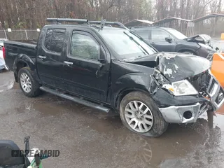 2011 Nissan Frontier Pro-4X with VIN 1N6AD0EV5BC440663, listed as a IAAI auction lot 41923918 with 168,331 mi miles and . Bid and sale history available at DreamBid. Image 1.