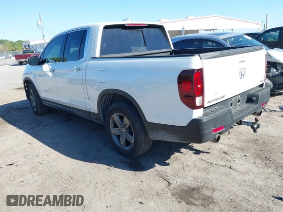 2021 Honda Ridgeline RTL-E with VIN 5FPYK3F7XMB011525, listed as a IAAI auction lot 41774012 with 98,031 mi miles and . Bid and sale history available at DreamBid. Image 3.