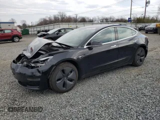 2019 Tesla Model 3 Long Range with VIN 5YJ3E1EB2KF197062, listed as a Copart auction lot 50874925 with 50,989 mi miles and Salvage Title. Bid and sale history available at carsss.com. Image 1.