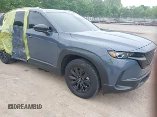 2025 Mazda CX-50 S Premium z VIN 7MMVABDMXSN316300, wystawiony jako IAAI lot #42209038 z przebiegiem 3169 mil mil oraz . Historia ofert i sprzedaży dostępna na DreamBid. Obrazek 1.