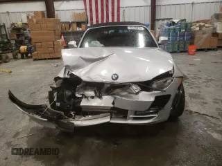 2011 BMW 1 Series 128i with VIN WBAUL7C52BVM80814, listed as a Copart auction lot 45150975 with 186,716 mi miles and Salvage title. Bid and sale history available at DreamBid. Image 5.