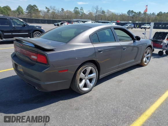 2014 Dodge Charger SE with VIN 2C3CDXBG0EH216023, listed as a IAAI auction lot 41827307 with 243,107 mi miles. Bid and sale history available at carsss.com. Image 4.