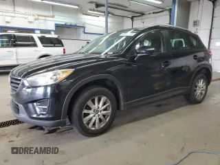 2016 Mazda CX-5 Sport z VIN JM3KE4BY5G0649623, wystawiony jako Copart lot #52376325 z przebiegiem 106 378 mil mil oraz Szkoda całkowita • Salvage title. Historia ofert i sprzedaży dostępna na DreamBid. Obrazek 1.