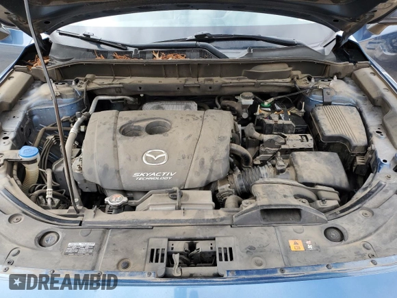 2017 Mazda CX-5 Sport with VIN JM3KFABL1H0116055, listed as a Copart auction lot 45044725 with 100,901 mi miles and Salvage Title. Bid and sale history available at carsss.com. Image 12.
