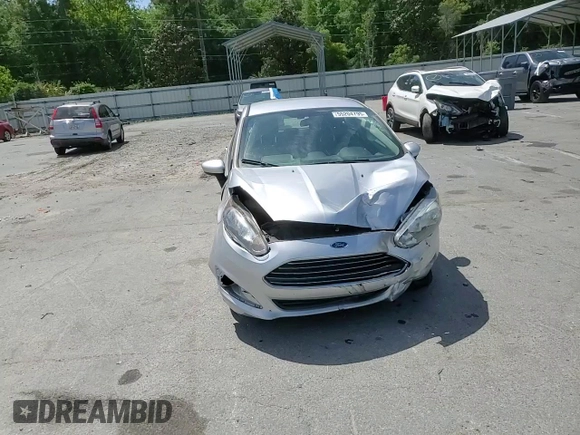 2019 Ford Fiesta SE z VIN 3FADP4EJ2KM142992, wystawiony jako Copart lot #55204795 z przebiegiem 98 018 mil mil oraz Szkoda całkowita • Salvage title. Historia ofert i sprzedaży dostępna na DreamBid. Obrazek 13.