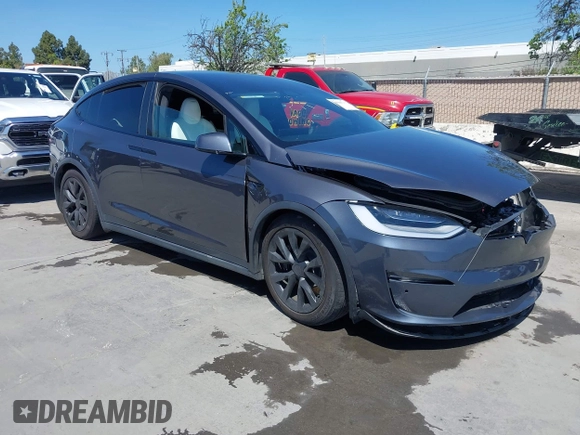 2022 Tesla Model X with VIN 7SAXCAE59NF360301, listed as a IAAI auction lot 41945059 with Not Provided miles and . Bid and sale history available at DreamBid. Image 1.
