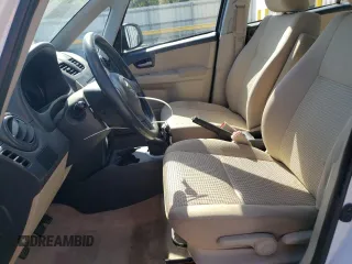 2012 Suzuki SX4 LE with VIN JS2YC5A35C6303637, listed as a Copart auction lot 71122474 with 169,761 mi miles and Salvage Title. Bid and sale history available at carsss.com. Image 7.