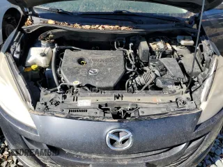 2014 Mazda 5 Grand Touring z VIN JM1CW2DL2E0178172, wystawiony jako Copart lot #80203094 z przebiegiem 248 026 mil mil oraz Czysty tytuł • Clean title. Historia ofert i sprzedaży dostępna na DreamBid. Obrazek 12.