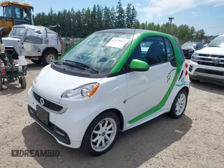 2014 Smart fortwo Passion with VIN WMEEJ9AA5EK783957, listed as a IAAI auction lot 42478047 with Not provided miles and . Bid and sale history available at DreamBid. Image 2.