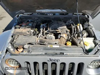 2015 Jeep Wrangler Sahara с VIN 1C4AJWBG1FL742588, выставлен на аукционе Copart как лот 72400274 с пробегом 139 520 миль миль и Списание • Salvage title. История ставок и продаж доступна на DreamBid. Изображение 11.