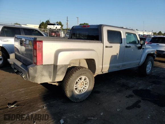 2009 Hummer H3 with VIN 5GNEN13E698128049, listed as a Copart auction lot 70453514 with 154,567 mi miles and Salvage Title. Bid and sale history available at DreamBid. Image 3.