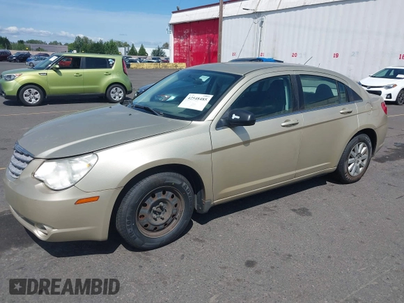 2010 Chrysler Sebring Touring z VIN 1C3CC4FBXAN144734, wystawiony jako IAAI lot #42548485 z przebiegiem 160 588 mil mil oraz . Historia ofert i sprzedaży dostępna na DreamBid. Obrazek 2.