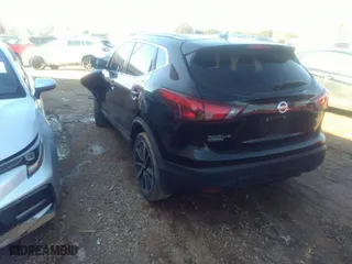 2017 Nissan Rogue Sport S with VIN JN1BJ1CP0HW026114, listed as a IAAI auction lot 41328821 with 84,807 mi miles. Bid and sale history available at carsss.com. Image 3.