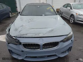 2017 BMW M4 with VIN WBS3R9C53HK709173, listed as a IAAI auction lot 41978162 with 105,427 mi miles. Bid and sale history available at carsss.com. Image 12.
