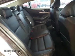 2016 Nissan Maxima SL with VIN 1N4AA6AP7GC387273, listed as a Copart auction lot 54103765 with 133,337 mi miles and Salvage Title. Bid and sale history available at DreamBid. Image 10.
