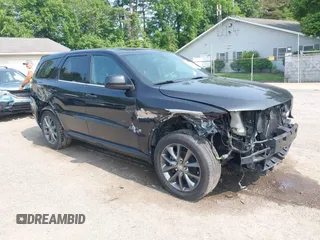 2014 Dodge Durango SXT z VIN 1C4RDJAG6EC594063, wystawiony jako IAAI lot #42380161 z przebiegiem 102 995 mil mil oraz . Historia ofert i sprzedaży dostępna na DreamBid. Obrazek 1.