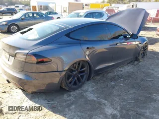 2022 Tesla Model S with VIN 5YJSA1E54NF488443, listed as a IAAI auction lot 41289281 with Not Provided miles and . Bid and sale history available at DreamBid. Image 4.