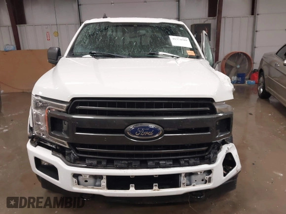 2020 Ford F-150 XL with VIN 1FTEW1EP7LFB52391, listed as a IAAI auction lot 41374589 with 75,700 mi miles and . Bid and sale history available at DreamBid. Image 13.