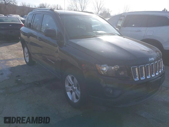 2014 Jeep Compass Latitude with VIN 1C4NJDEBXED661930, listed as a IAAI auction lot 41501558 with 94,133 mi miles and . Bid and sale history available at DreamBid. Image 1.
