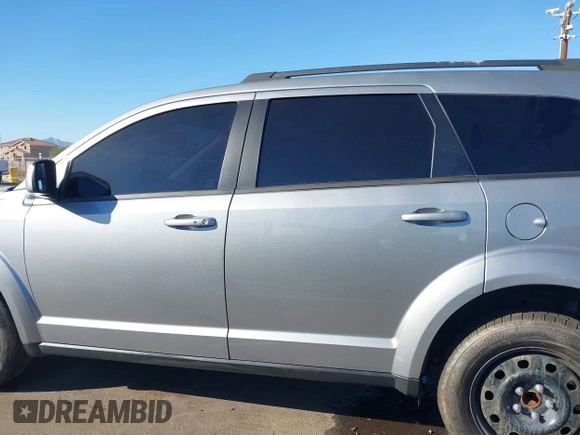 2019 Dodge Journey SE with VIN 3C4PDCBG0KT701223, listed as a IAAI auction lot 41286446 with 71,572 mi miles and . Bid and sale history available at DreamBid. Image 14.