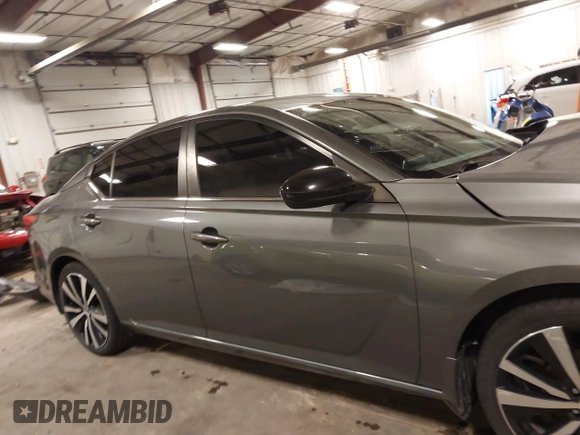 2019 Nissan Altima SR with VIN 1N4BL4CV6KC186522, listed as a IAAI auction lot 41773234 with 95,654 mi miles and . Bid and sale history available at DreamBid. Image 14.