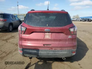 2018 Ford Escape SE z VIN 1FMCU9GD0JUC29279, wystawiony jako Copart lot #54511595 z przebiegiem 77 547 mil mil oraz Czysty tytuł • Clean title. Historia ofert i sprzedaży dostępna na DreamBid. Obrazek 6.