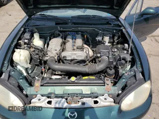 2000 Mazda MX-5 Miata with VIN JM1NB3533Y0151883, listed as a Copart auction lot 64423925 with 180,275 mi miles and Salvage title. Bid and sale history available at DreamBid. Image 11.