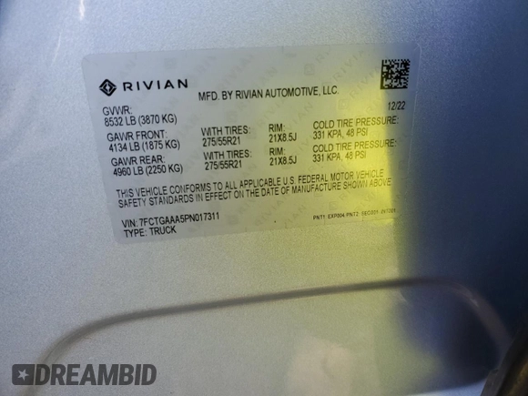 2023 Rivian R1T Adventure z VIN 7FCTGAAA5PN017311, wystawiony jako Copart lot #42523755 z przebiegiem 35 039 mil mil oraz Szkody całkowita. Historia ofert i sprzedaży dostępna na DreamBid. Obrazek 13.