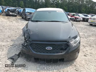 2014 Ford Police Interceptor with VIN 1FAHP2MK0EG131679, listed as a Copart auction lot 53848965 with 163,894 mi miles and Salvage title. Bid and sale history available at DreamBid. Image 5.