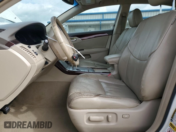 2010 Toyota Avalon XL with VIN 4T1BK3DB1AU367110, listed as a Copart auction lot 53719905 with 187,214 mi miles and Salvage Title. Bid and sale history available at DreamBid. Image 7.