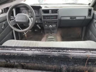 1993 Nissan Frontier с VIN 1N6SD11S1PC422206, выставлен на аукционе Copart как лот 80961204 с пробегом 261 085 миль миль и На запчасти • Non repairable. История ставок и продаж доступна на DreamBid. Изображение 8.