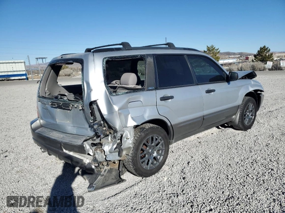 2003 Subaru Forester XS with VIN JF1SG65603G741030, listed as a Copart auction lot 46109315 with 154,469 mi miles and Salvage title. Bid and sale history available at DreamBid. Image 3.