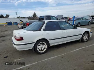 1991 Acura Integra with VIN JH4DB1669MS009690, listed as a Copart auction lot 42462585 with 300,660 mi miles and Salvage title. Bid and sale history available at DreamBid. Image 3.