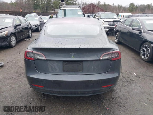 2019 Tesla Model 3 Mid Range with VIN 5YJ3E1EA3KF307415, listed as a IAAI auction lot 41673239 with 42,895 mi miles and . Bid and sale history available at DreamBid. Image 16.