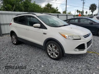 2013 Ford Escape SEL with VIN 1FMCU0HXXDUA70618, listed as a Copart auction lot 65431165 with 200,773 mi miles and Clean title. Bid and sale history available at DreamBid. Image 4.