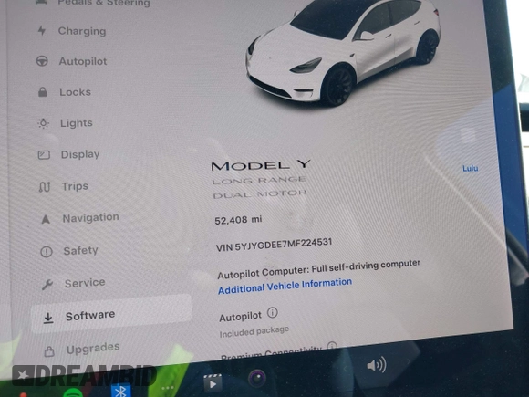 2021 Tesla Model Y Long Range with VIN 5YJYGDEE7MF224531, listed as a IAAI auction lot 38454442 with 52,408 mi miles. Bid and sale history available at carsss.com. Image 7.