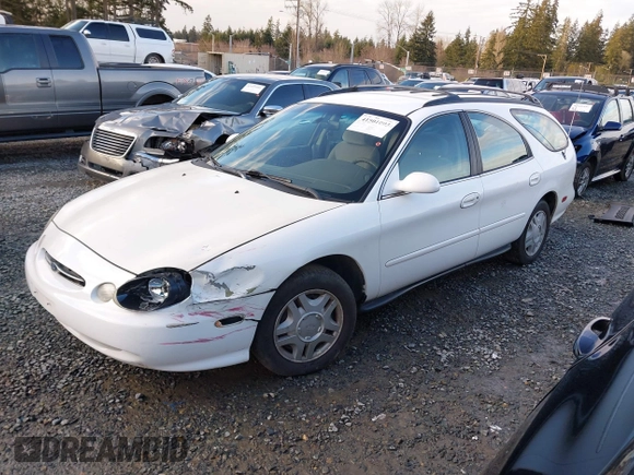 1999 Ford Taurus SE Standard with VIN 1FAFP58U5XG200924, listed as a IAAI auction lot 41501093 with 105,102 mi miles and . Bid and sale history available at DreamBid. Image 17.