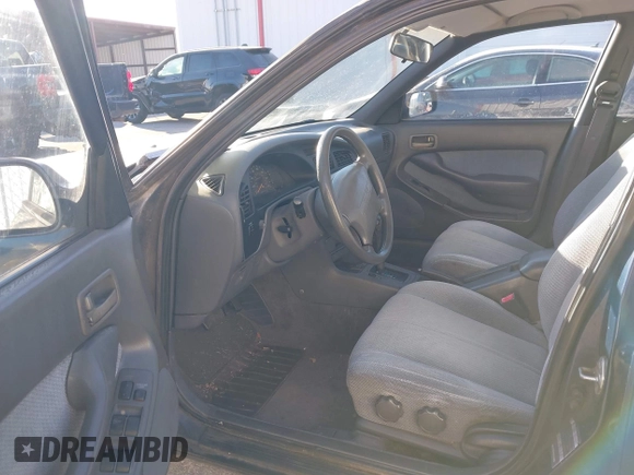 1994 Toyota Camry LE with VIN 4T1SK12EXRU374215, listed as a IAAI auction lot 41581093 with 80,397 mi miles. Bid and sale history available at carsss.com. Image 5.