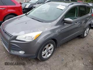 2014 Ford Escape SE with VIN 1FMCU9GX8EUA65568, listed as a IAAI auction lot 42435114 with 128,278 mi miles and . Bid and sale history available at DreamBid. Image 2.