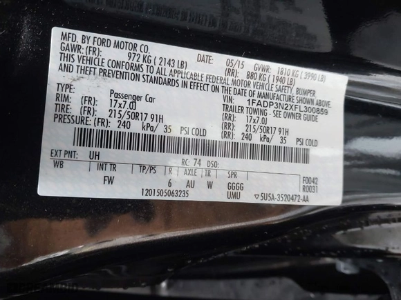 2015 Ford Focus Titanium with VIN 1FADP3N2XFL300859, listed as a IAAI auction lot 41944410 with 76,194 mi miles. Bid and sale history available at carsss.com. Image 9.