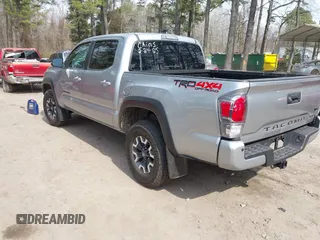 2022 Toyota Tacoma SR with VIN 3TMCZ5ANXNM497511, listed as a IAAI auction lot 41670710 with 26,277 mi miles and . Bid and sale history available at DreamBid. Image 3.