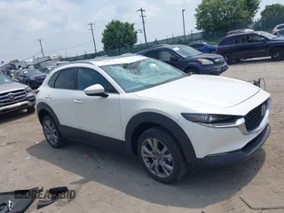 2021 Mazda CX-30 Premium with VIN 3MVDMBDL0MM307045, listed as a IAAI auction lot 42446494 with 33,112 mi miles and . Bid and sale history available at DreamBid. Image 1.