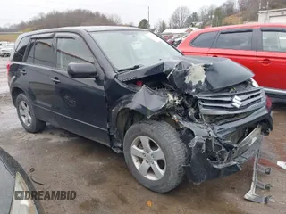 2013 Suzuki Grand Vitara Premium z VIN JS3TD0D66D4100457, wystawiony jako IAAI lot #40919340 z przebiegiem 102 850 mil mil oraz . Historia ofert i sprzedaży dostępna na DreamBid. Obrazek 1.