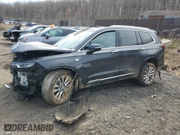 2022 Cadillac XT6 Premium Luxury with VIN 1GYKPDRS9NZ120814, listed as a Copart auction lot 51143485 with 70,977 mi miles and Salvage Title. Bid and sale history available at carsss.com. Image 1.