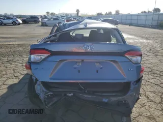 2021 Toyota Corolla LE with VIN 5YFEPMAE4MP267852, listed as a Copart auction lot 49284315 with 27,157 mi miles and Salvage Title. Bid and sale history available at DreamBid. Image 6.